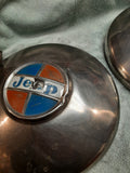 Jeep hubcaps lot of three, 1960's original, stainless caps as shown.